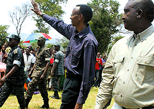 President Kagame waves to residents on his arrival at Ndego in Kayonza district where he wound up the land re-distribution supervision exercise yesterday. (Photo/ G. Barya)