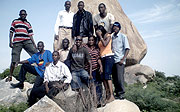 The author (seated with sun-glasses) with some of the students from EACSU, at one of Dodomau2019s large rocks.
