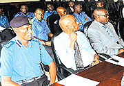 Assistant Commissioner of Police Lambert Sano (L) and other officers at the workshop at Police headquarters, Kacyiru. (Photo/J. Mbanda)