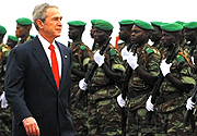 US President George W Bush kicked off his six-day five-nation tour of Africa in Benin, where he was welcomed by President Thomas Boni Yayi. (Photo/Reuters)