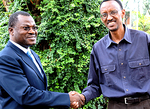 President Kagame shakes hands with Angolan presidentu2019s Special Envoy and Foreign Affairs minister, Joao Bernardo De Miranda, at State House in Kiyovu yesterday. (PPU photo)