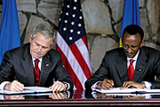 Presidents Bush and Kagame sign a Bilateral Investment Treaty on Tuesday at Village Urugwiro. ( PPU Photo)