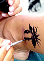 A FINE IMITATION: Temporary tattoos look just like the real thing.