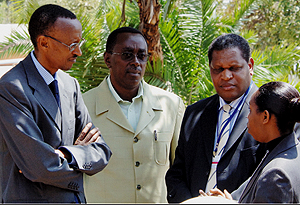 President Kagame with Prime Minister Bernard Makuza, Speaker of Chamber of Deputies, Alfred Mukezamfura, and Chief Justice Aloysie Cyanzayire during a break at the in Akagera Game Lodge yesterday. (PPU photo)