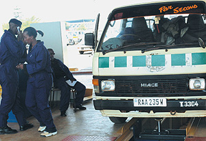 A taxi minibus being inspected at newly launched Rwanda Automobile Inspection Centre, Remera, on Wednesday. (Photo/ J. Mbanda)