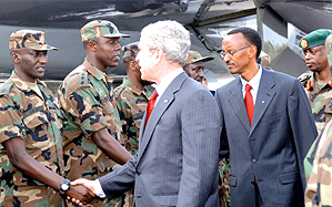 US President George W. Bush, accompanied by President Paul Kagame, greets RDF officers who have previously served in Darfur. This was during the formeru2019s visit to Rwanda last month. (File Photo)