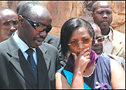 Former IBUKA president Franu00e7ois Ngarambe (L) and Kigali City Vice Mayor Jeanne du2019Arc Gakuba in grief at Kigali Memorial Centre yesterday. (Photo/J. Mbanda).