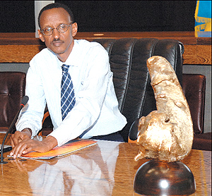 President Kagame after receiving the award (pictured) in the Cabinet meeting hall at Village Urugwiro yesterday.