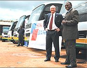Steve Caley, the Fina Bank Rwanda boss and Col. (RTD). Dodo Twahirwa.