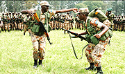 RDF troops during a morale-boosting session shortly before flying out to the Darfur mission. (File photo)