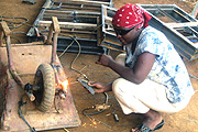 A lady welding in Kicukiro. (Photo / S. Nkurunziza).