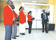 stockbrokers at  Rwanda Over-The-Counter (OTC) market. (Photo / E. Mucunguzi).