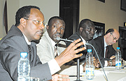 Ministers Butare (L) and Ntawukuriryayo at a meeting with development partners. (Photo/E. Mucunguzi).