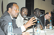 Ministers Butare (L) and Ntawukuriryayo at a meeting with development partners. (Photo/E. Mucunguzi).