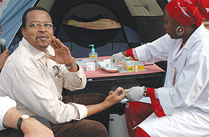 The Executive Chairman of King Faisal Hospital in Kigali, Dr. Innocent Nyaruhirira, at one of the voluntary  HIV testing centres. (File photo).