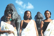 L-R ORTPNu2019s Rosette Chantal Rugamba, Infrastructure Minister Linda Bihire and City Mayor Aisa Kirabo after unveiling the Gorilla monument in the city centre. (Photo / J. Mbanda)