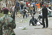 Kenyan police battle rioters in Nairobi streets.