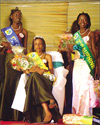 Miss KIE Nazia Mutungirehe sitting in her chair after getting her crown (left and right are 1st run-up Delphine Rwamungu and 2nd run-up Jackie Uwamungu).