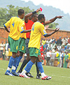 OFF YOU GO: Rwandan players mob and plead with the Ivorian referee who sent off Mbuyu Twite (not in picture) in the first leg against Morocco in Kigali. (Photo/ G. Barya)