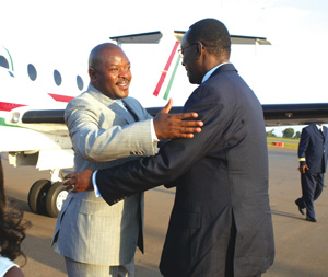 President Pierre Nkurunziza being met by Prime Minister Bernard Makuza on arrival at Kigali International Airport yesterday (Photo / G. Barya)
