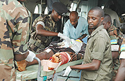 Victims of the earthquake that hit Cyangungu early this year being help by army medics. (File Photo).