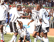 APR players celebrating their Peace cup win against Atraco. The army side head into this yearu2019s Cecafa/Kagame Cup  club championship with favorites tag. (Photo / G. Barya).