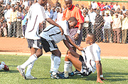 HERO AND VILLAIN: Mwemere (middle) was at fault for Miembeniu2019s first goal and Mugiraneza (on the ground) pulled one back for APR but it wasnu2019t enough as the Zanzibarians won the contest 2-1.