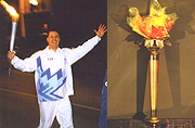 Carrying the Olympic Torch (L) and Olympic Torch Cellophone: Smaller than our lighted torches, these Olympic symbols have a cellophane simulation of the flame.