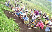 Residents dig terraces: The G.8 should help Africa modernise agriculture.