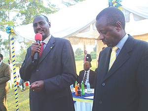 Ambassador Ignatius Kamali Karegyesa delivers His Excellency Paul Kagameu2019s message to his former school Ntare School in Mbarara, while Ugandau2019s Transport Minister John Nasarira who represented Ugandau2019s President Yoweri Museveni looks on.