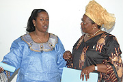 Dr. Agnes Binagwaho, the CNLS Executive Secretary chats with Theresse Zeba, UNFPA Country Representative after signing M.o.U (Photo/ G.Barya)