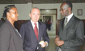 L-R Supreme Court Secretary General, Anne Gahongayire, Justice Richard Goldstone and the Vice President of the Supreme Court, Sam Rugege chat at the Supreme Court on Friday. (Photo/ G.Barya)