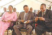 President Paul Kagame, First Lady, Jeanette(L) and Minister of Local Government Protais Musoni (R) were present at launching the issuing of identity cards on July 17 at the National Identity Card Project offices at Kimihurura. (File photo)
