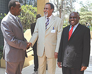 Prime Minister Bernard Makuza (L) greets Defence Ministers Yusuf Haji of Kenya (C) and Crispus kiyonga of Uganda at Serena Hotel. (Photo/ J. Mbanda).