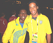 The writer enjoys good moments with Brazilian super star Ronaldinho in Beijing-China.
