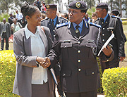 The acting Commissioner General of Police, Mary Gahonzire (R) talks to Josephine Odera of UNIFEM at Police Headquarters, Kacyiru. (Photo J.Mbanda).