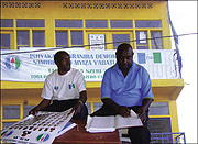 Rwamukwaya Athanase consults his superior, Gasana Jean Baptiste, after a dayu2019s campaign.