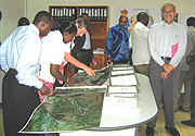 Some ICF officials receiving explanations on how Rwanda mapped some land plots in the country. (Photo/ E. Kwibuka)