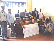 REASON TO SMILE : HHC staff receiving their donations from FINA Bank.(Courtesy Photo)