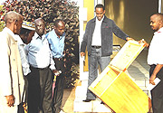 EMPTY:  Electoral officials display the ballot box before voting commenced at the Rwanda Embassy in Kampala, Uganda.