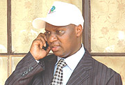 Communication Time- NEC Executive Secretary Charles Munyaneza talks to electoral officials from upcountry.