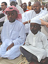Two young Muslims attend prayers. (Photo/J.Mbanda).