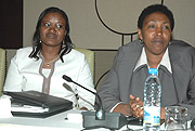 Minister in Charge of EAC, Monique Mukaruliza, and EALA member Patricia Hajabakiga (R)  at the closing ceremony of EALA conference at Serena Hotel yesterday. (Photo G.Barya).