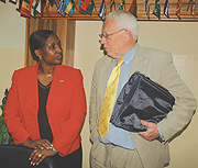 Foreign Affairs Minister, Rosemary Museminali talks to the Head of the European Commission Delegation in Rwanda, Amb. David MacRae.