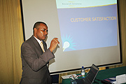 Kahiga Wachira, a consultant from Research Solutions making a presentation on Wednesday (Photo J.Mbanda)