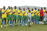 IN LINE OF DUTY:  Amavubi Stars  sing the national athem before their clash with Moroccou2019s Atlas Lions in Kigali, which the hosts won 3-1.