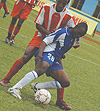 OUT: Abedi Mulendau2019s desired dream return to Rayon put him in trouble with the football governing body, Ferwafa. Here, the striker seen playing for the Blues in a Caf tie in 2005. (File photo)