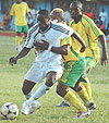 APRu2019s Kabange Twite beats Atracou2019s Amoroso to the ball during a league game last season. Kabange will be instrumental in keeping APR within touching distance of Atraco. (File photo).    