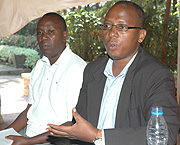CNLSu2019 Fulgence Kamari (R) explains a point at  the opening of the workshop while Janvier Rukwatage looks on. (Photo/G.Barya)