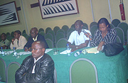 Hotel proprietors discuss proposed contract terms. (Photo/ R.Mugabe).